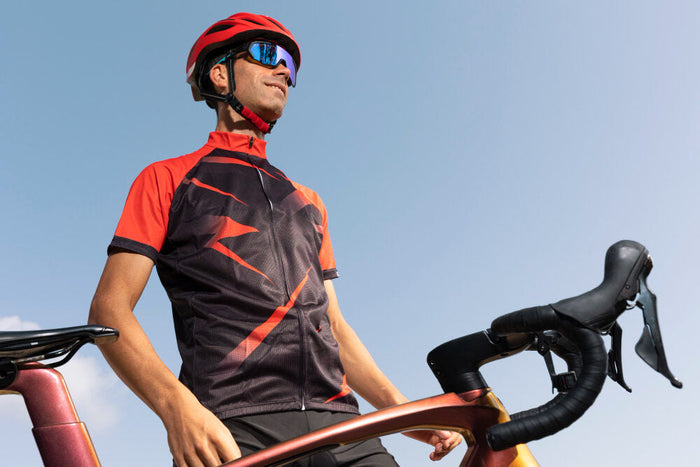 A cyclist equipped with essential accessories for beginners is ready to ride