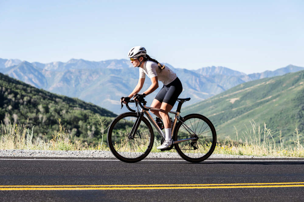 Cyclist riding through the mountains on a bike